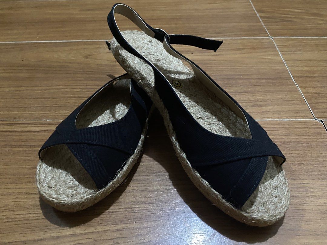 Black Espadrille Sandals Size 9 (Category: Flats & Sandals) located in Paranaque City. Submitted by ilove.preloved (Listing ID 1470865527, Image 2). Description: - Color: Classic black with neutral beige abaca string inner lining - Style: Cross-strap front design with slingback and adjustable buckle ankle strap - Material: Jute rope woven soles for a stylish summer vibe - Size: 9 (Inner sole measures approx. 26 cm in total length) - Condition: Br