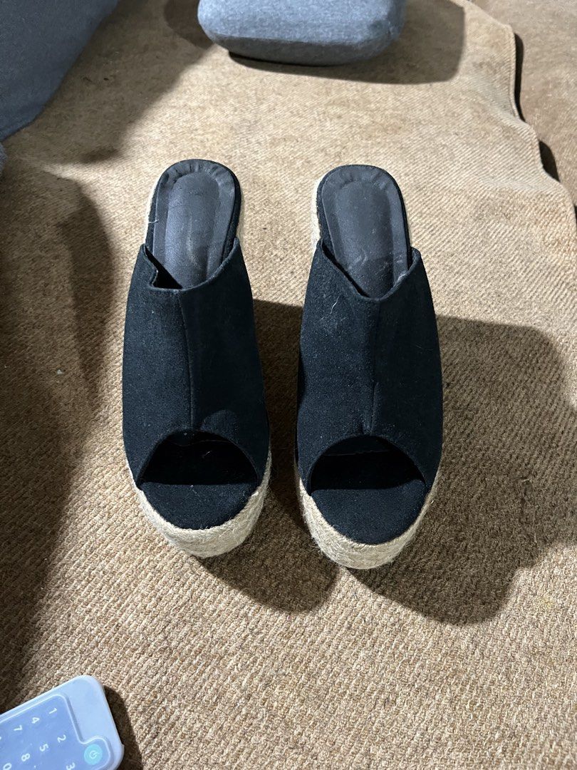 Black Espadrille Wedge Platform Mules Size 39 (Category: Wedges) located in Manila. Submitted by madfitzz (Listing ID 1470901416, Image 1). Description: - Style: Slip-on mule wedge sandals - Color: Black fabric upper - Heel: Woven jute platform wedge with rubber heel tap - Toe: Open toe - Size: EU 39 (stamped on sole) - Condition: Pre-loved with minimal wear and light scuffing on soles - Origin: Made in China.