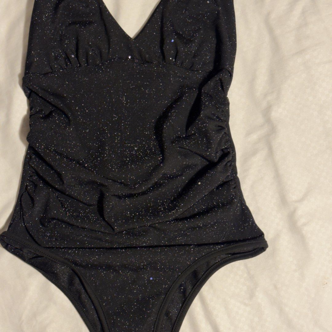 Black Glitter Halter Bodysuit (Category: Sleeveless) located in Manila. Submitted by shopmakii (Listing ID 1470892498, Image 1). Description: - Brand: Shein - Size: Extra Small (XS) - Condition: Worn a few times, solid condition - Great for night outs!.