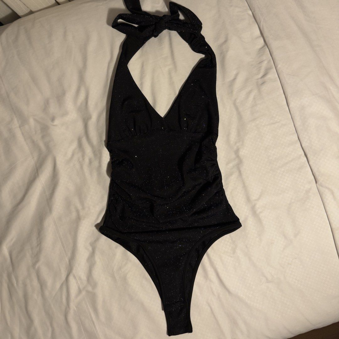Black Glitter Halter Bodysuit (Category: Sleeveless) located in Manila. Submitted by shopmakii (Listing ID 1470892498, Image 2). Description: - Brand: Shein - Size: Extra Small (XS) - Condition: Worn a few times, solid condition - Great for night outs!.