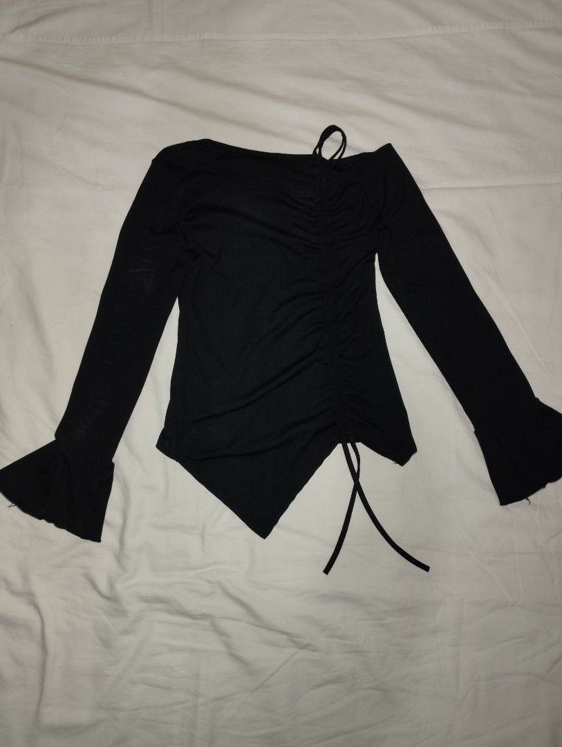Black Long Sleeve Ruched Asymmetric Neckline Top (Category: Longsleeves) located in Manila. Submitted by harrisonna97887 (Listing ID 1470767954, Image 1). Description: - Color: Black - Size: Fits XS to S comfortably - Condition: Worn once for a mirror selfie, freshly washed and properly stored - Features: Asymmetric neckline, ruched front, flared bell sleeves, and adjustable drawstrings at the hem - Material: Stretchy, super flattering fabric - P