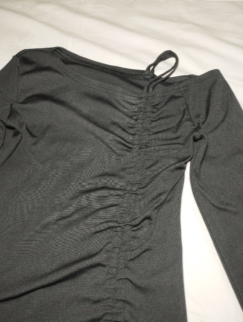 Black Long Sleeve Ruched Asymmetric Neckline Top (Category: Longsleeves) located in Manila. Submitted by harrisonna97887 (Listing ID 1470767954, Image 2). Description: - Color: Black - Size: Fits XS to S comfortably - Condition: Worn once for a mirror selfie, freshly washed and properly stored - Features: Asymmetric neckline, ruched front, flared bell sleeves, and adjustable drawstrings at the hem - Material: Stretchy, super flattering fabric - P