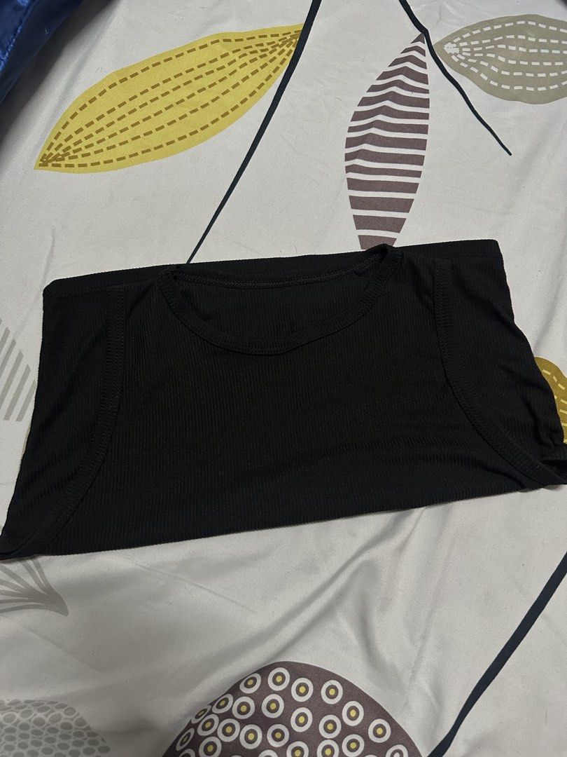 Black ribbed crop tank top sleeveless (Category: Sleeveless) located in Manila. Submitted by francellin (Listing ID 1470765387, Image 2). Description: - Color: Classic Black - Style: Cropped tank top - Material: Stretchy ribbed fabric - Design: Round neckline, sleeveless - Fit: Perfect for pairing with high-waist jeans or skirts - Condition: Clean, like-new with no flaws.