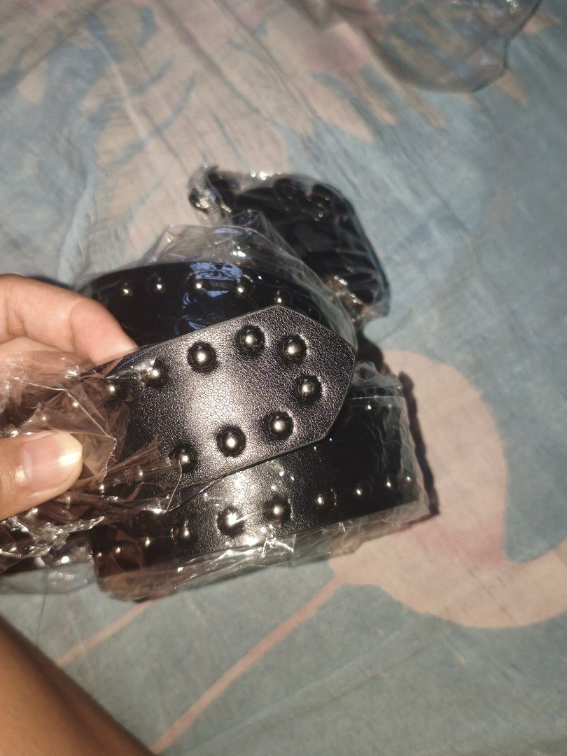 black studded with hello kitty skull buckle (Category: Belts) located in Manila. Submitted by avwilynn (Listing ID 1470829603, Image 3). Description: *Black Studded Belt with Hello Kitty Skull Buckle* Y2K / emo / grunge style belt. *Details:* - *Color:* Black faux leather with silver studs all around - *Buckle:* Big metal buckle - Hello Kitty skull with bow and crossbones, heart eyes design - black enamel with silver outline - *Size:* Wide belt, 