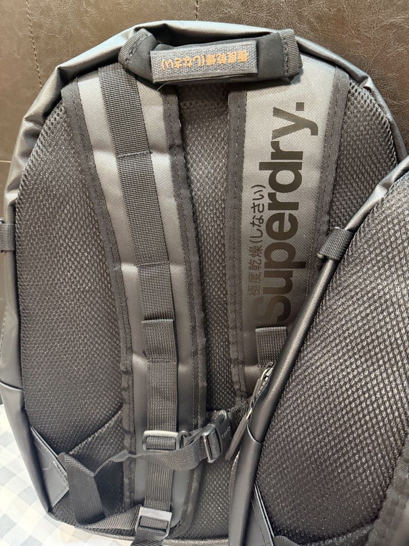 Black Superdry Backpack - Imported from Vietnam (Category: Backpacks) located in Makati City. Submitted by gigidvd (Listing ID 1470824167, Image 2). Description: - Brand new from Vietnam factories - Multiple zippered compartments and external pockets for easy organization - Interior organization slots for pens and small essentials - Comfortable padded mesh shoulder straps with adjustable chest strap.