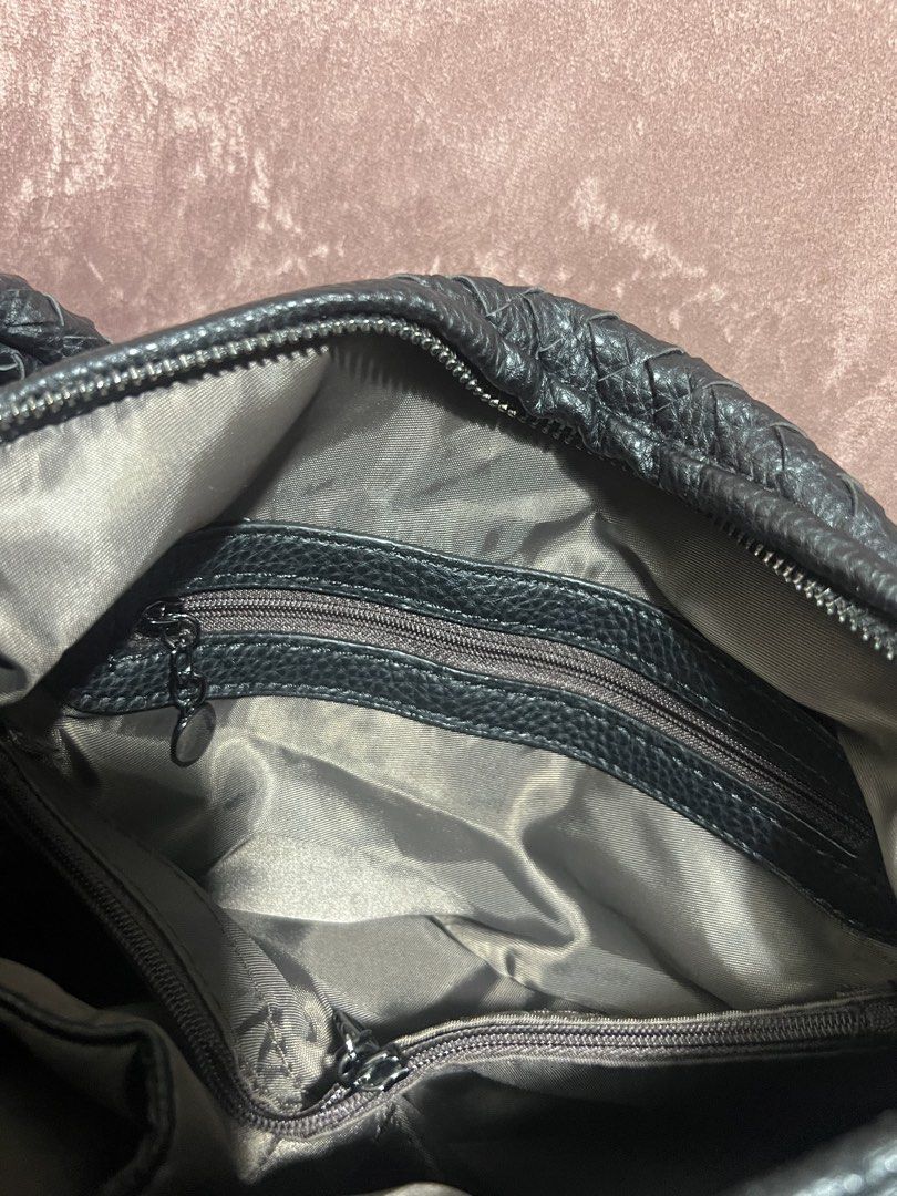 Black Woven Leather Shoulder Bag (Category: Shoulder Bags) located in Manila. Submitted by malggg (Listing ID 1470882758, Image 3). Description: (Making space for new things!) Got this from the 🍊 app. Used a lot but not abused :) Haven’t reached for this in so long so I’m letting go. 1 main compartment and 3 pockets! MOD: Grab/Lalamove same-day delivery (within Metro Manila), J&T (outside Metro Manila) - shipping fee c/o buyer MOP: BPI/Unionbank