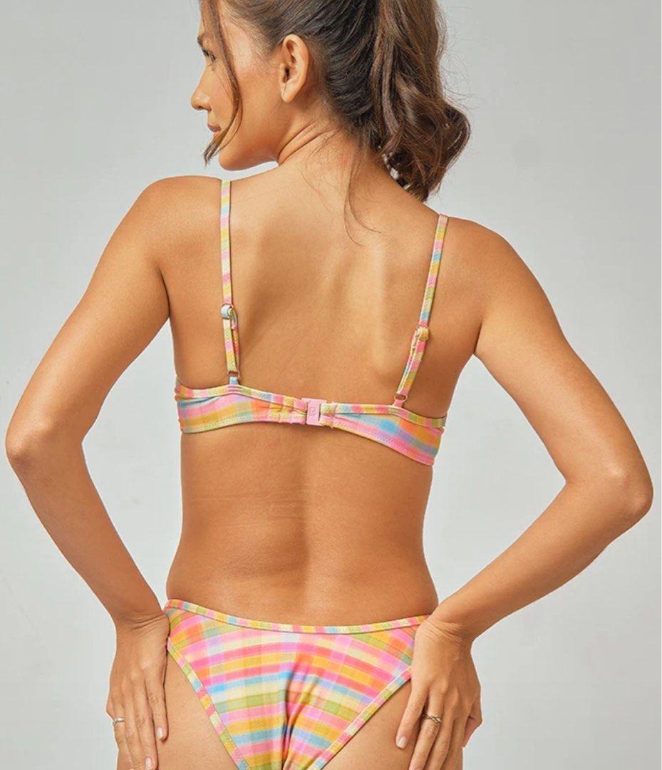 Blackbough Swim Underwire Bikini Top (Category: Bikinis & Swimsuits) located in Makati City. Submitted by piasab_ (Listing ID 1470781813, Image 2). Description: - Brand: Blackbough Swim - Size: XS - Style: Underwire bikini top with colorful plaid pattern and embroidered white daisies - Features: Adjustable shoulder straps and secure back clasp closure - Condition: Brand new with tags attached, never worn - Ideal for: Beach days and pool parties.