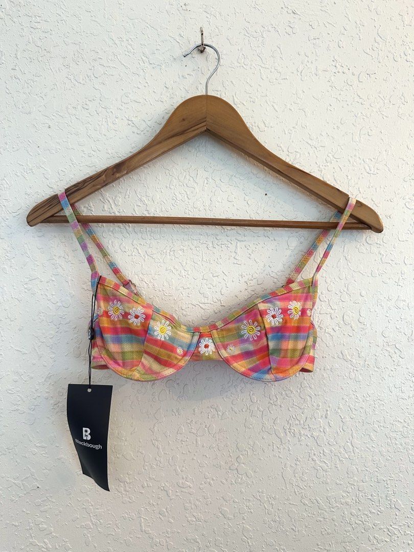 Blackbough Swim Underwire Bikini Top (Category: Bikinis & Swimsuits) located in Makati City. Submitted by piasab_ (Listing ID 1470781813, Image 3). Description: - Brand: Blackbough Swim - Size: XS - Style: Underwire bikini top with colorful plaid pattern and embroidered white daisies - Features: Adjustable shoulder straps and secure back clasp closure - Condition: Brand new with tags attached, never worn - Ideal for: Beach days and pool parties.