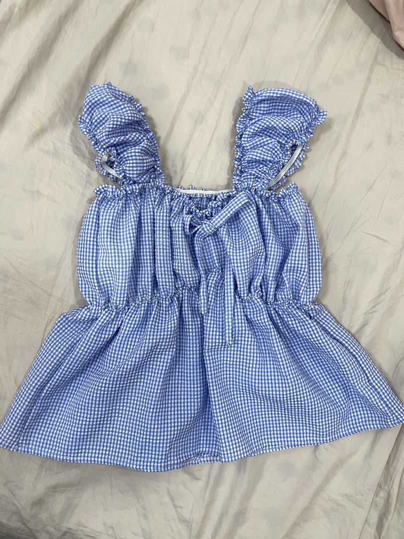 Blue and White Flowy Gingham Top (Category: Sleeveless) located in Pasay City. Submitted by nashandma_ (Listing ID 1470846775, Image 1). Description: Fits XS-S Rfs: Impulsive buy.