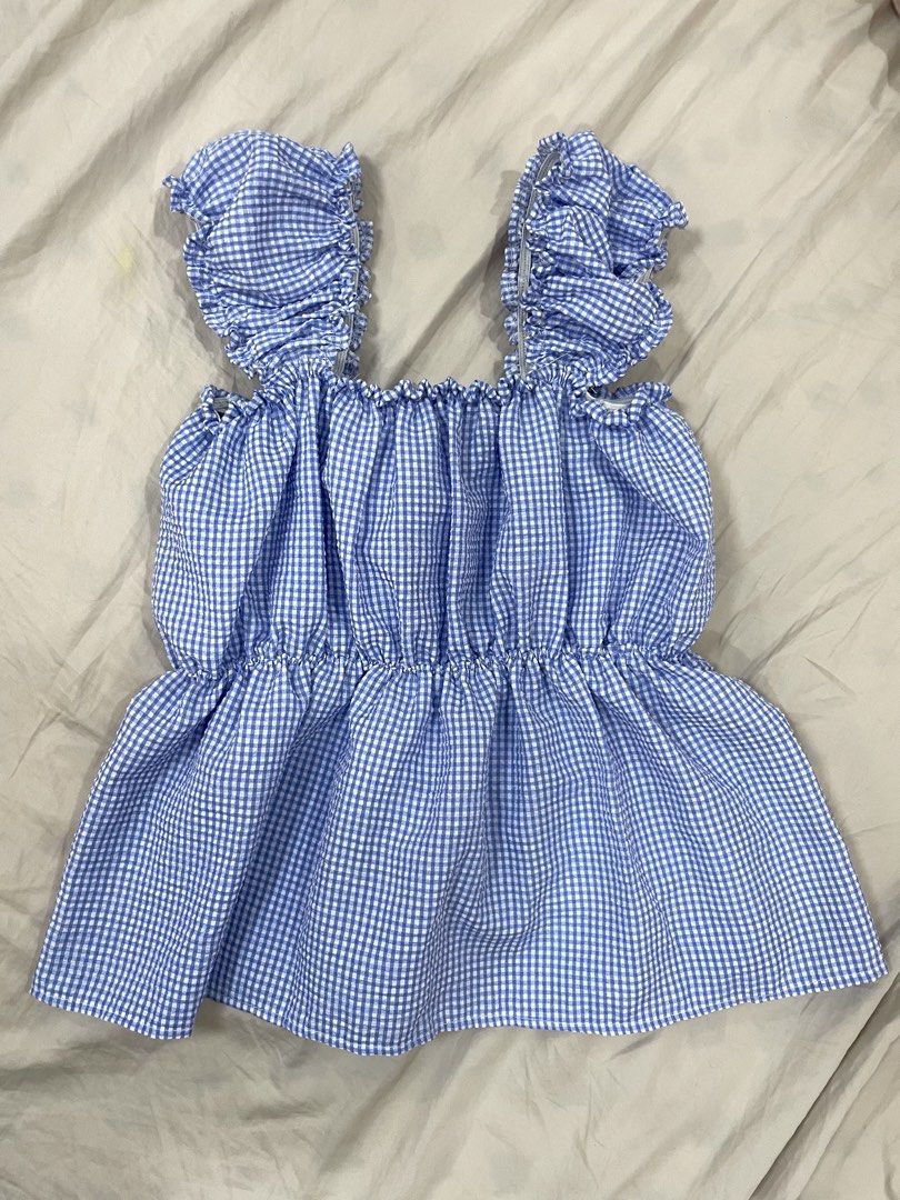 Blue and White Flowy Gingham Top (Category: Sleeveless) located in Pasay City. Submitted by nashandma_ (Listing ID 1470846775, Image 2). Description: Fits XS-S Rfs: Impulsive buy.