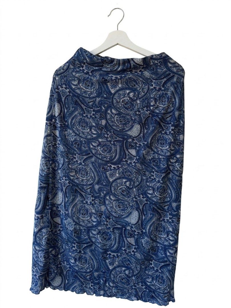 Blue and White Paisley Pattern Long Skirt (Category: Skirts) located in Taguig. Submitted by luxeria_ (Listing ID 1470781399, Image 1). Description: - Blue and white all-over paisley pattern - Long silhouette with a comfortable slip-on waistband - Finished with trendy lettuce hem edges - Lightweight and breathable fabric - Versatile for casual day outs or evening events.