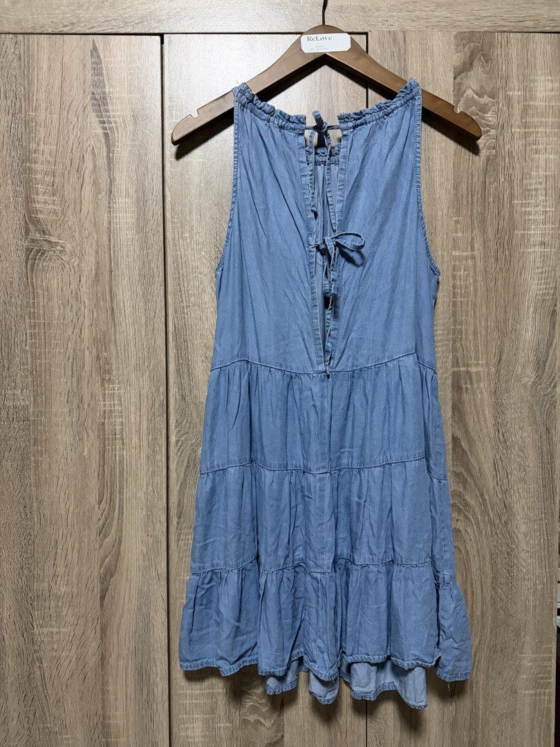 Blue Denim Tiered Dress (Category: Dresses) located in Bulacan. Submitted by relove.re (Listing ID 1470930065, Image 2). Description: Chic and comfy! ✨ Light blue denim-style dress featuring a sleeveless design, adjustable spaghetti straps, a gathered neckline, and a flowy tiered skirt. Perfect for casual outings, weekend strolls, or everyday wear. Size S to M 📩 Message ReLove to order! #ReLoveCollection #PrelovedFashion #CasualWear #DenimDress.