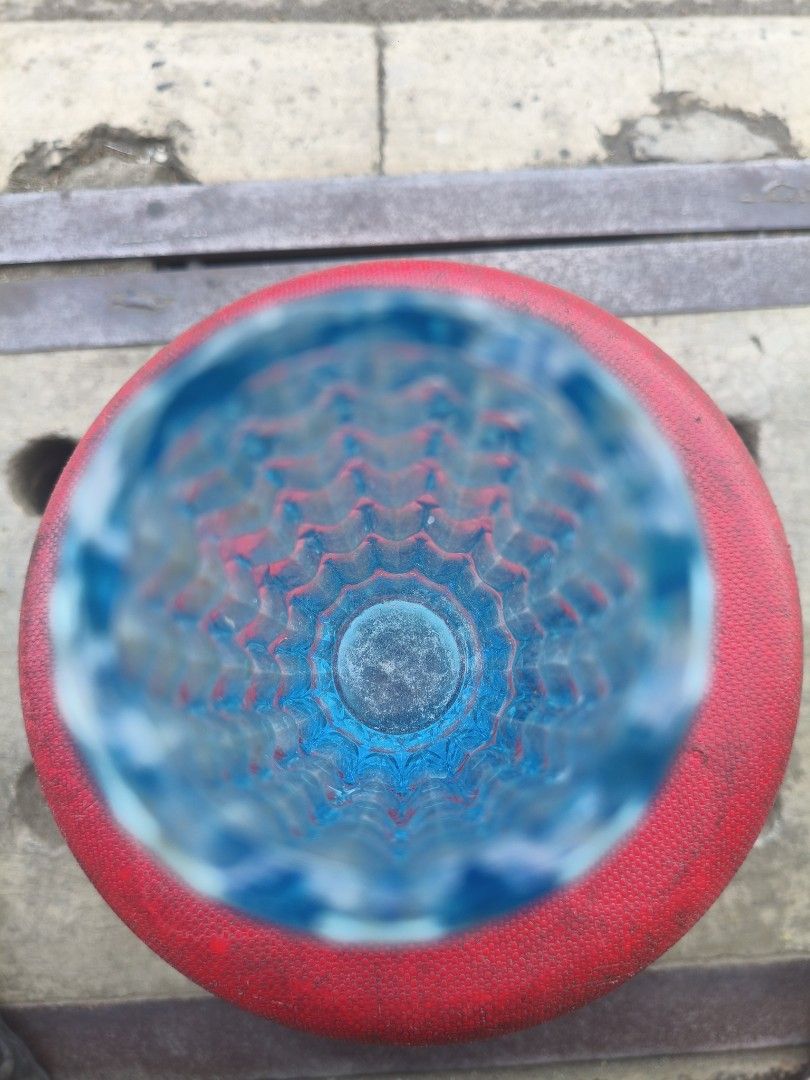 Blue Glass Flower Vase with Textured Pattern (Category: Vases & Decorative Bowls) located in Manila. Submitted by tonio124 (Listing ID 1470786533, Image 2). Description: - Color: Bright blue - Material: Heavy, thick glass - Design: All-over textured scale pattern with a straight cylindrical shape and flared rim - Versatile use: Ideal for fresh flower arrangements or as a standalone tabletop and shelf decor piece.
