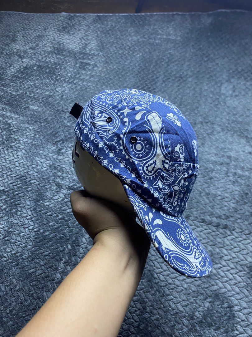 Blue Paisley Print 5-Panel Cap with Rabbit Patch (Category: Caps & Hats) located in Olongapo. Submitted by WAVYT (Listing ID 1470893622, Image 3). Description: - Style: Blue paisley print 5-panel cap - Detail: Small embroidered white rabbit patch with a red accent on the side - Closure: Adjustable black strap with plastic buckle - Comfort: Black inner sweatband lining - Condition: Clean inside and out, ready to wear.