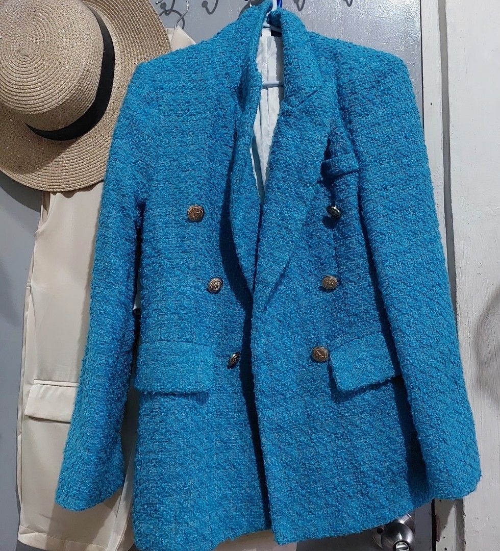 Blue Tweed Double-Breasted Blazer with Gold Buttons (Category: Coats, Jackets and Outerwear) located in Taguig. Submitted by hhhcherish (Listing ID 1470790562, Image 2). Description: - Style: Double-breasted tweed blazer - Color: Vibrant blue with shiny gold embossed buttons on front and cuffs - Features: Structured shoulders, white fully lined interior, and hip flap pockets - Versatility: Great pop of color for work or casual outfits -Xs to Smal