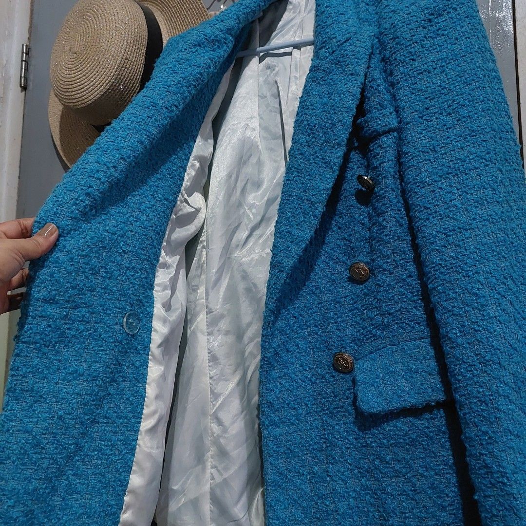 Blue Tweed Double-Breasted Blazer with Gold Buttons (Category: Coats, Jackets and Outerwear) located in Taguig. Submitted by hhhcherish (Listing ID 1470790562, Image 3). Description: - Style: Double-breasted tweed blazer - Color: Vibrant blue with shiny gold embossed buttons on front and cuffs - Features: Structured shoulders, white fully lined interior, and hip flap pockets - Versatility: Great pop of color for work or casual outfits -Xs to Smal
