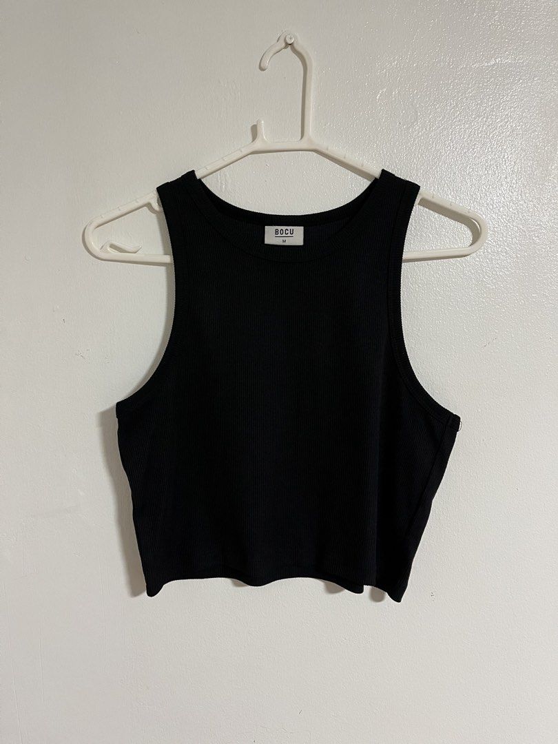 BOCU Black Ribbed Crop Tank Top (Category: Sleeveless) located in Cabuyao City. Submitted by rdtrmt (Listing ID 1470743859, Image 1). Description: - Brand: BOCU - Color: Classic black - Size: Medium - Material: Comfortable ribbed knit - Design: Thick straps and scoop neckline - Fit: Crop top style - Style: Versatile basic piece that goes with everything - Condition: still in good condition.