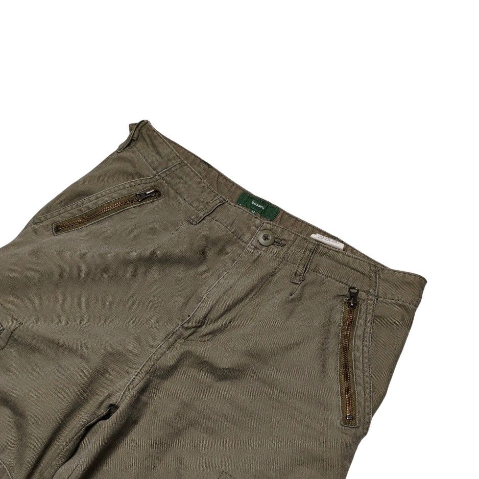 Bossini Olive Green Cargo Pants Size 32 (Category: Jeans) located in Meycauayan. Submitted by thrifting_gorilla (Listing ID 1470886599, Image 3). Description: Bossini Olive Green Cargo Pants Size 32 - Brand: Bossini - Color: Olive green - Material: Heavy-duty cotton - Fit: Straight cut leg - Waist: 16.5 inches across flat - Closure: Button with YKK zipper fly - Pockets: Multiple utility pockets, including 2 zipped front pockets, cargo leg pockets