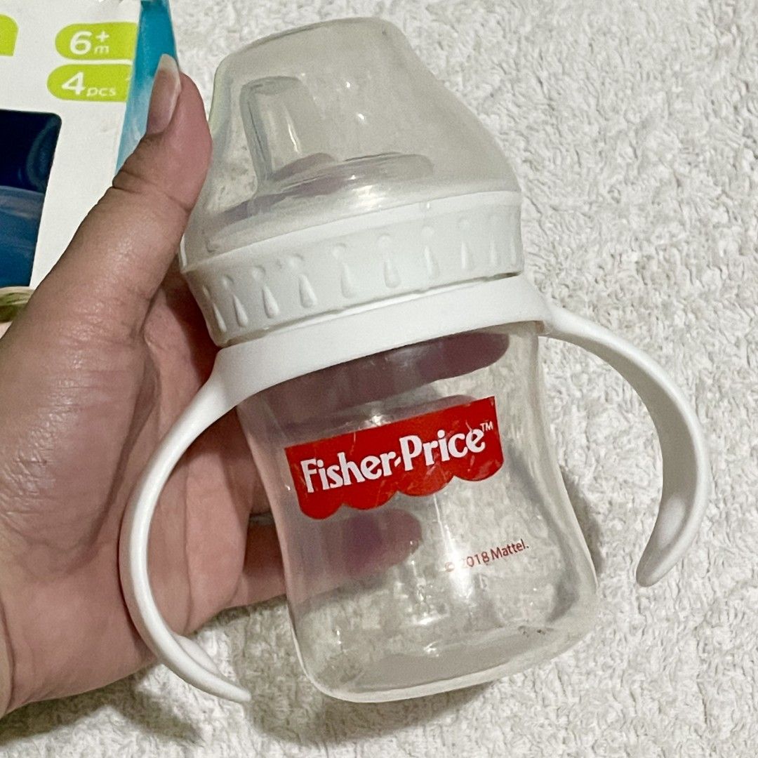 Bottle Bundle (For Baby) (Category: Babies & Kids Fashion) located in Pasig City. Submitted by ela_zen15 (Listing ID 1470786459, Image 2). Description: Bundle 3 pcs Bebeta Food Storage Fisher Price Training Cup Bebeta 5 Stage Feeding System Take all Can do lalamove sagot nyo po sf.
