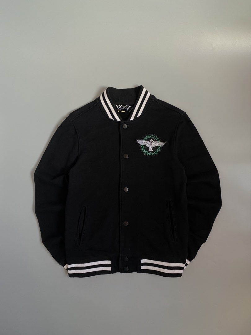 Boy London Rose Embroidery Varsity Jacket (Category: Coats, Jackets and Outerwear) located in Cavite. Submitted by awuuu27 (Listing ID 1470748013, Image 2). Description: B0Y L0ND0N Varsity Jacket 💎 DIMES: Width-20/Length-25(S-M) CONDITION: 9.5/10 COLOR RATE: 9.5/10 ISSUE: noneorn circle - Back Design: Large white eagle graphic, 'BOY' lettering, and embroidered red roses with green vines.