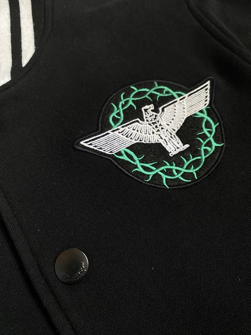 Boy London Rose Embroidery Varsity Jacket (Category: Coats, Jackets and Outerwear) located in Cavite. Submitted by awuuu27 (Listing ID 1470748013, Image 3). Description: B0Y L0ND0N Varsity Jacket 💎 DIMES: Width-20/Length-25(S-M) CONDITION: 9.5/10 COLOR RATE: 9.5/10 ISSUE: noneorn circle - Back Design: Large white eagle graphic, 'BOY' lettering, and embroidered red roses with green vines.