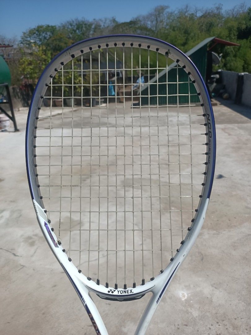 Branded Tennis Rackets (Category: Racket and Ball Sports) located in Taguig. Submitted by grandfish_55ab5c (Listing ID 1470770589, Image 3). Description: - Brand/Model: Wimbledon Rosa tennis racket - Color/Strings: Dark grey frame with white strings - Technology: Sweet spot anti-vibration tech on the sides - Condition: Strung, ready to play, normal scuffs from recreational play - Specs: Standard grip size - Ideal for: Casual matches and weekend p