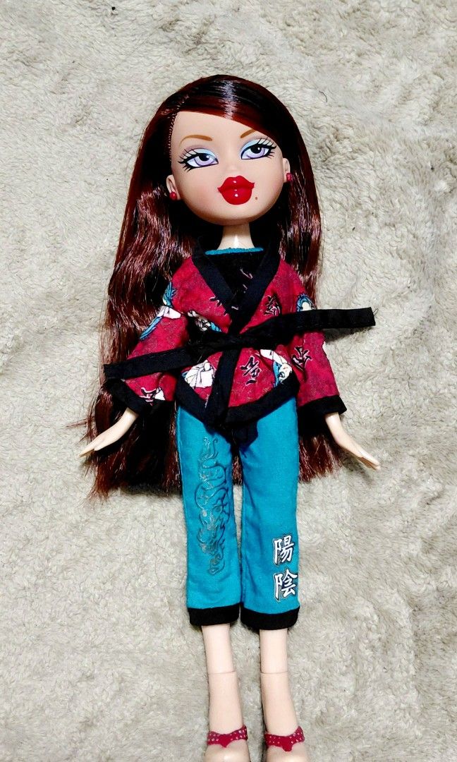 Bratz kickin karate roxxi (Category: Kids Toys) located in Rizal. Submitted by hannicomb_ (Listing ID 1470728647, Image 2). Description: complete with her box. di lang po nasama -same price i bought her for po. - head is still squeaky after boil washed - no issue on her screening - sweet screening pm!.