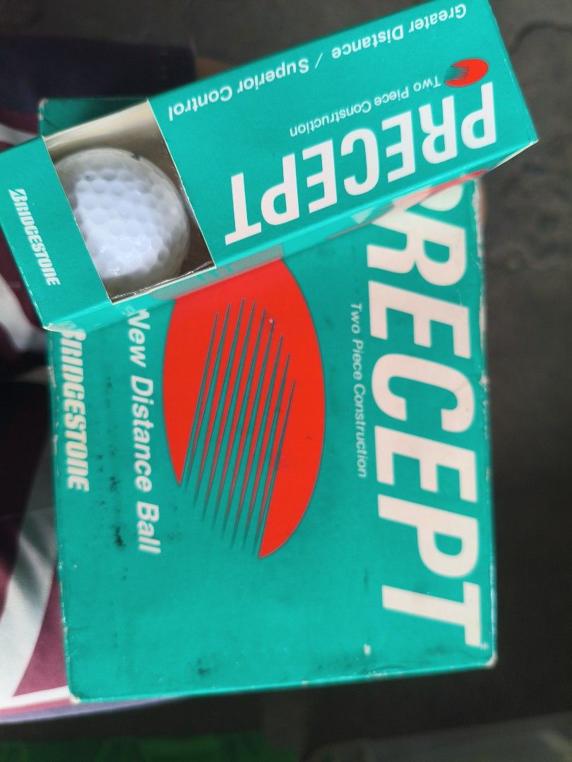 Bridgestone Precept Two Piece Construction Distance Golf Balls Box (Category: Golf) located in Manila. Submitted by tonio124 (Listing ID 1470797817, Image 3). Description: - Item: Vintage Bridgestone Precept Golf Balls - Packaging: Original green box included (shows some storage wear and scuffing) - Condition: Inner sleeves and golf balls are brand new/unused - Performance: Two-piece construction designed for maximum distance and superior control