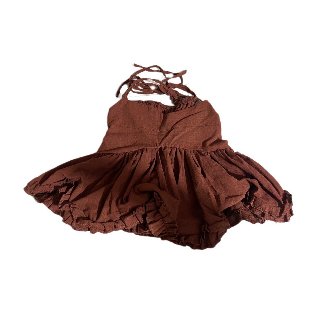 Brown Peplum Top (Category: Sleeveless) located in Bulacan. Submitted by erinbtrc (Listing ID 1470827336, Image 1). Description: 10/10 Condition Color Brown Fits XS-Small No Issue/Flaws Can do Same Day Delivery (Lalamove) If Metro Manila or J&T Delivery.