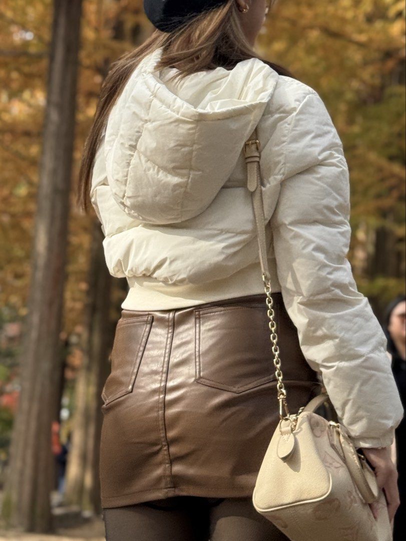 SHEIN Brown PU Leather Bodycon Skirt (Category: Skirts) located in Manila. Submitted by prelovedbychellyy (Listing ID 1470851263, Image 3). Description: USED ONCE during my autumn trip Bought it ₱540 selling for 349 only Very good condition Fits size 26-27 Also selling my puffer jacket for ₱1000.
