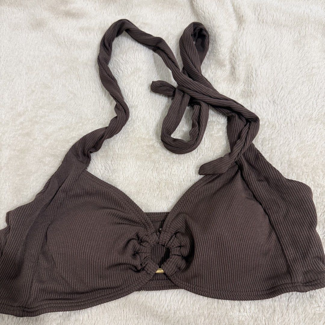 Brown Ribbed Bikini Set with Gold O-Rings (Category: Bikinis & Swimsuits) located in Manila. Submitted by kbm._. (Listing ID 1470929733, Image 2). Description: - Style: Brown ribbed two-piece swimsuit with halter neck and matching bottoms - Hardware: Elegant central gold ring link on top and gold-tone rings on both sides of the bottoms - Material: Textured fabric with great stretch for a comfortable fit - Condition: Excellent/Worn once for a quic