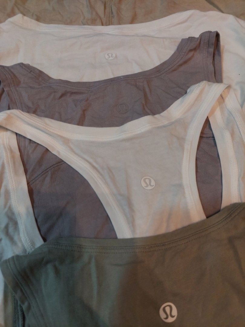 ❗️❗️BUNDLE❗️❗️ 5 PCS. LULULEMON TOPS (Category: Activewear) located in San Pedro. Submitted by cyanide.slug.cat (Listing ID 1470853169, Image 2). Description: small to large like new condition all are posted individually w dimensions.