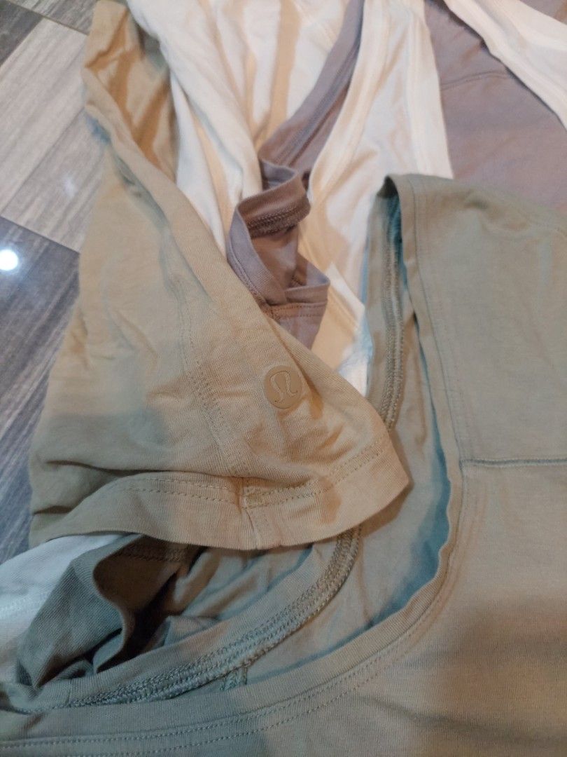 ❗️❗️BUNDLE❗️❗️ 5 PCS. LULULEMON TOPS (Category: Activewear) located in San Pedro. Submitted by cyanide.slug.cat (Listing ID 1470853169, Image 3). Description: small to large like new condition all are posted individually w dimensions.