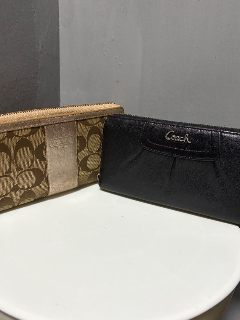 [Bundle] Coach Black and pinkLeather Zip Around Wallet (Category: Wallets & Card holders) located in Quezon City. Submitted by silentstar.3e0b05 (Listing ID 1470694428, Image 2). Description: - Authentic Coach wallet in classic black and pink leather - Secure zip-around closure keeps cash and cards safe - Stylish pleated design adds a touch of texture - Compact size fits easily into handbags.