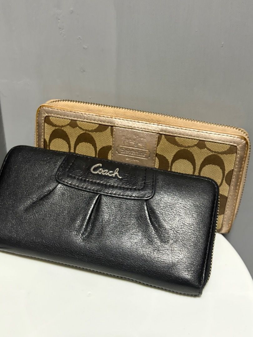 [Bundle] Coach Black and pinkLeather Zip Around Wallet (Category: Wallets & Card holders) located in Quezon City. Submitted by silentstar.3e0b05 (Listing ID 1470694428, Image 1). Description: - Authentic Coach wallet in classic black and pink leather - Secure zip-around closure keeps cash and cards safe - Stylish pleated design adds a touch of texture - Compact size fits easily into handbags.