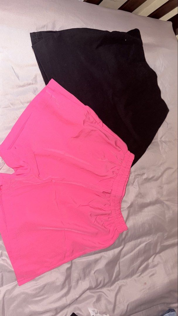 Bundle! Pink short and black skort (Category: Shorts) located in Quezon City. Submitted by shrlane (Listing ID 1470889349, Image 1). Description: - best fit 27-29 - Comfortable elastic waistband for an easy, flexible fit - Lightweight and breathable fabric - Versatile pieces ideal for workouts, errands, or lounging at home.