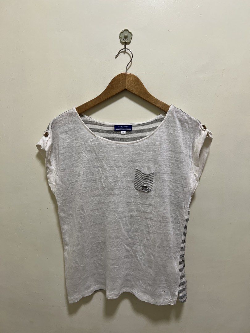 Burberry Blue Label White Sleeveless (Category: Luxury Apparel) located in Manila. Submitted by thriftpoint99 (Listing ID 1470815142, Image 1). Description: 19.5x22 No issue Excellent condition.
