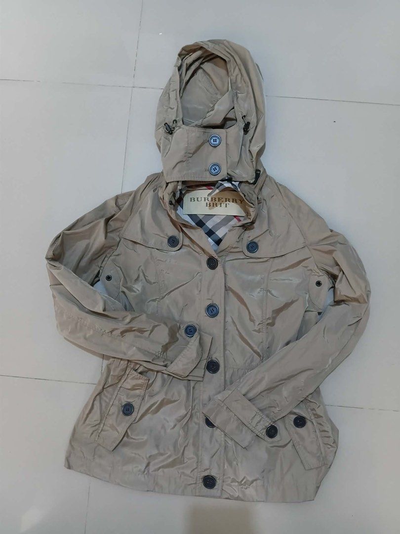 Burberry Brit Beige Hooded Jacket Coat (Category: Coats, Jackets and Outerwear) located in Manila. Submitted by kuya_erick62 (Listing ID 1470760238, Image 1). Description: - Brand: Burberry Brit - Color: Classic Beige - Size/Fit: Standard fit, great for layering - Material: 100% polyester (outer and lining), lightweight - Features: Hood, front button closure, signature check lining inside the collar, multiple utility pockets on front and sleeves 