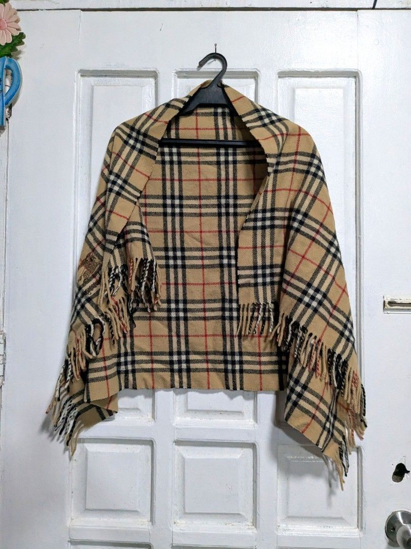 Burberry Nova Check Plaid Shawl (Category: Luxury Accessories) located in Quezon City. Submitted by nnncorner (Listing ID 1470877113, Image 3). Description: ​Original Burberry's Nova Check Plaid Classic Shawl in Camel Brown 100% New Wool 120cm x 65 cm 9/10 condition No any issues Rare Item and collection Original price 280$, you may check online din. 100% authentic and bought from Japan DRY CLEAN ONLY Selling : 3,000.