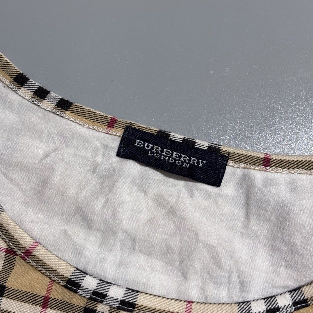 Burberry Plaid Sleeveless Shirt (Category: Luxury Apparel) located in Bacolod City. Submitted by Hanap_ukay (Listing ID 1470825819, Image 3). Description: Burberry Plaid Sleeveless Shirt Size: Medium Women Excellent 1,000.
