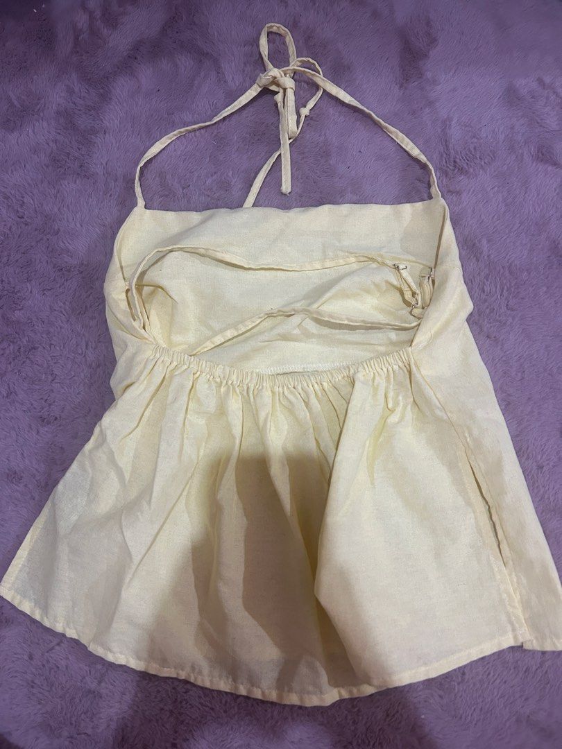butter yellow backless top (Category: Sleeveless) located in Manila. Submitted by divalicious_ (Listing ID 1470808686, Image 1). Description: 🧺 only used once – just needs a bit of love (steaming / ironing) 🪡 no defects! 💌 could wear as a halter too ! 🧷 size: xs to medium (adjustable) 📬 mop: gcash 📦 mod: lalamove (buyer shoulders shipping fee) seller will not liable for any shipping-related issues. .