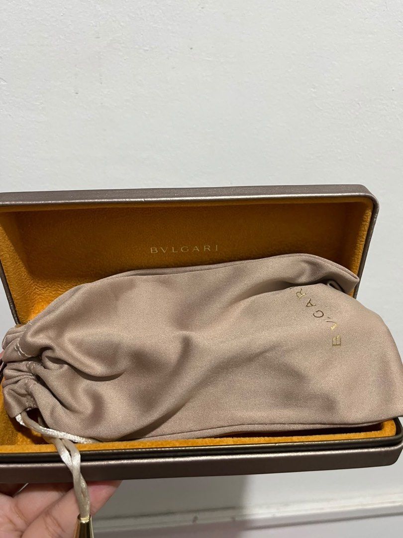 BVLGARI Sunglasses with Original Case and Pouch (Category: Sunglasses & Eyewear) located in Marilao. Submitted by ryuryuzj73716 (Listing ID 1470838455, Image 3). Description: - price slightly negotiable Brand: Authentic BVLGARI - Frame: Classic black with elegant gold-tone temple accents - Lenses: Gradient dark lenses - Inclusions: Original branded hard case, fabric dust pouch with drawstring, and BVLGARI logo box - Condition: Pristine, well-main