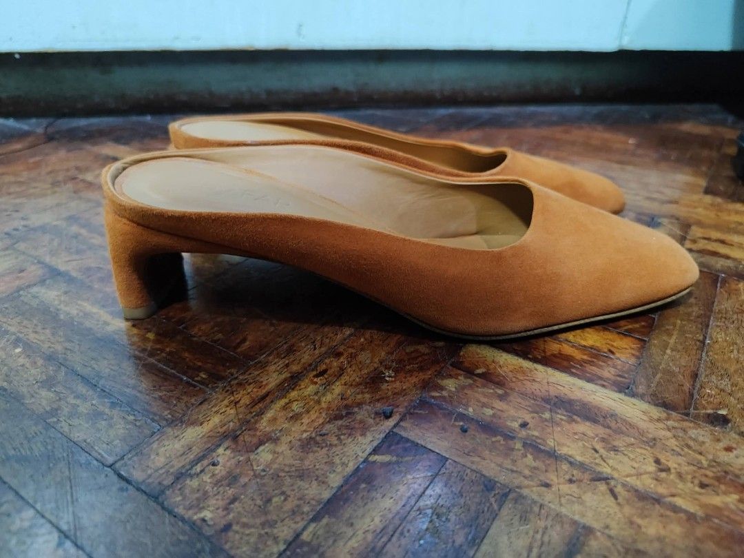 by FAR Suede Mules Tan (Category: Heels) located in Bacoor. Submitted by stargazer1084 (Listing ID 1470836613, Image 2). Description: - Brand: by FAR - Material: Premium tan suede - Design: Easy slip-on with chic square toe - Heel: Comfortable chunky low heel for everyday wear - Color: Versatile neutral earth tone - Details: Clean insoles with embossed brand logo - Condition: Well-maintained and ready to wear.