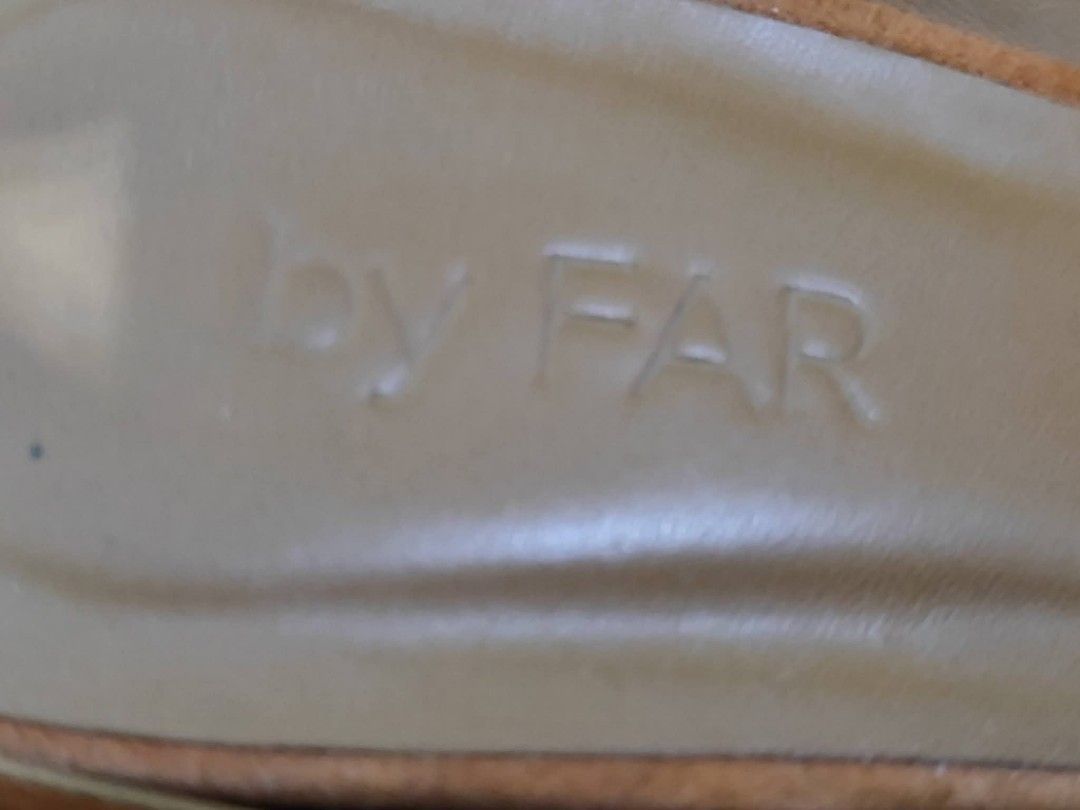by FAR Suede Mules Tan (Category: Heels) located in Bacoor. Submitted by stargazer1084 (Listing ID 1470836613, Image 3). Description: - Brand: by FAR - Material: Premium tan suede - Design: Easy slip-on with chic square toe - Heel: Comfortable chunky low heel for everyday wear - Color: Versatile neutral earth tone - Details: Clean insoles with embossed brand logo - Condition: Well-maintained and ready to wear.