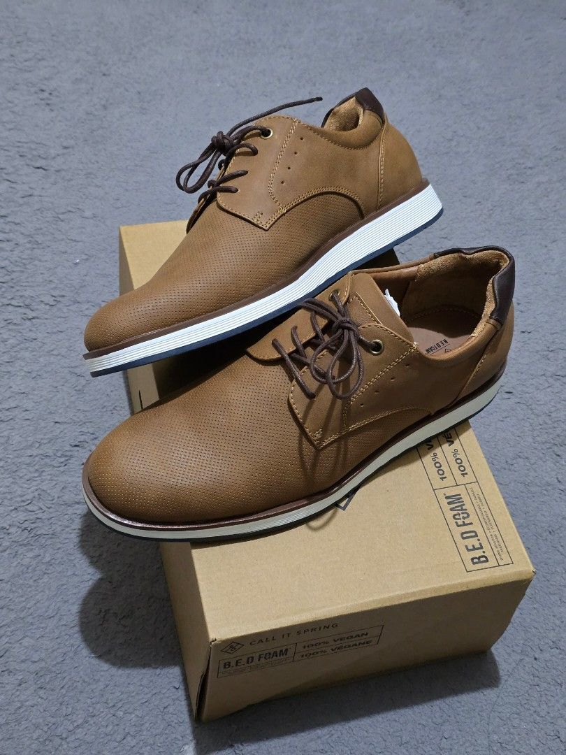 Call It Spring Tan Oxford Shoes with Box (Category: Dress Shoes) located in Manila. Submitted by drake.wayne (Listing ID 1470875375, Image 2). Description: - Brand: Call It Spring - Style: Tan brown synthetic leather oxfords with dark brown heel accent - Features: Perforated upper details, lace-up front closure, and thick white sole - Comfort & Materials: B.E.D. Foam technology, 100% vegan construction - Inclusions: Original shoebox included - Br