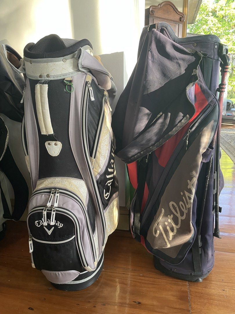 Callaway and Titleist Golf Bags (Category: Golf) located in Manila. Submitted by carmelabj (Listing ID 1470746554, Image 2). Description: - Callaway Golf Bag: Stylish black, grey, and white design with large branding - Titleist Golf Bag: Classic navy blue and red colorway with prominent Titleist text - Storage: Multiple zippered pockets on both bags for clubs, balls, and accessories - Portability: Equipped with sturdy handles and comfortable stra