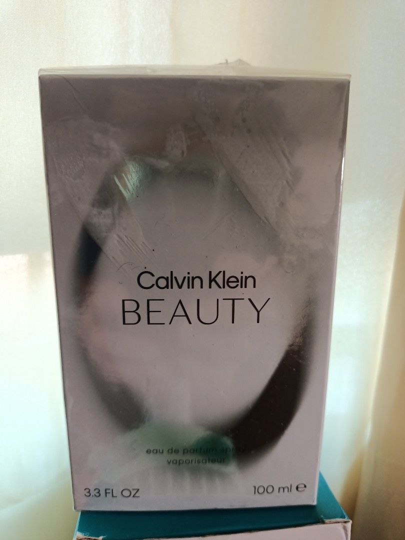 Calvin Klein Beauty Eau de Parfum 100ml (Category: Fragrance & Deodorants) located in Imus. Submitted by reynes.mei79 (Listing ID 1470746124, Image 1). Description: - Brand: Calvin Klein Beauty ORIGINAL bought in London - Type: Eau de Parfum (EDP) Spray - Size: Large 100 ml / 3.3 fl. oz. - Condition: Brand new, tightly wrapped in original cellophane packaging - Origin: Made in France by Coty - Fragrance: Classic floral scent in a standard retail 