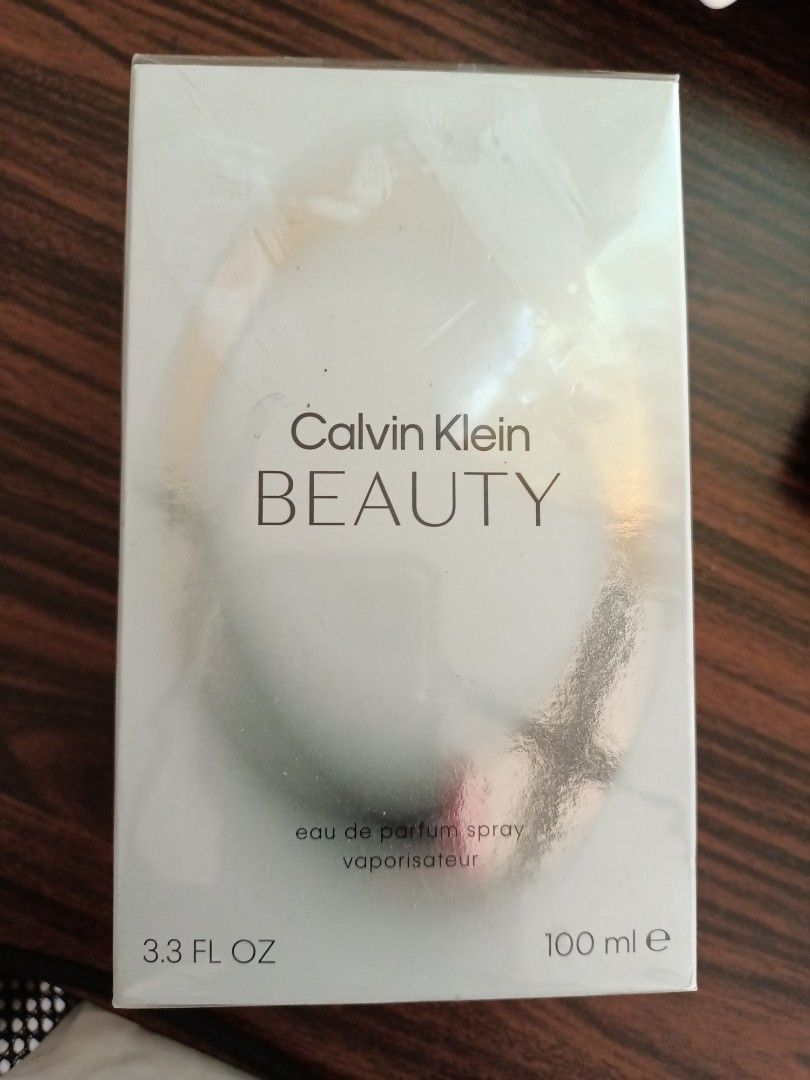 Calvin Klein Beauty Eau de Parfum 100ml (Category: Fragrance & Deodorants) located in Imus. Submitted by reynes.mei79 (Listing ID 1470746124, Image 2). Description: - Brand: Calvin Klein Beauty ORIGINAL bought in London - Type: Eau de Parfum (EDP) Spray - Size: Large 100 ml / 3.3 fl. oz. - Condition: Brand new, tightly wrapped in original cellophane packaging - Origin: Made in France by Coty - Fragrance: Classic floral scent in a standard retail 