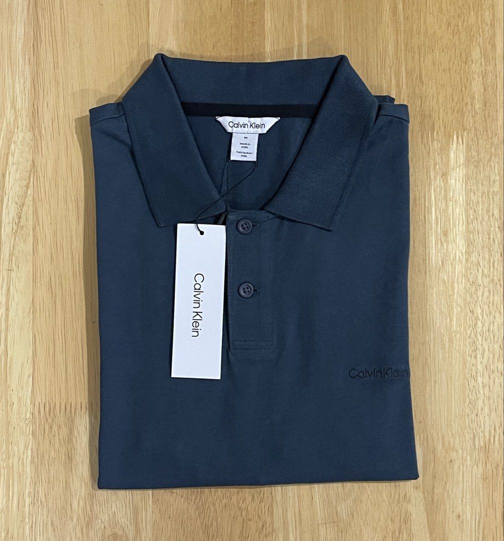 Calvin Klein Men's Polo Shirt Medium (Category: Tshirts & Polo Shirts ) located in Valenzuela. Submitted by adine000 (Listing ID 1470777688, Image 1). Description: Men's Polo Shirt✨ Regular fit Embroidered Logo Color: Navy Blue Medium W21" x L28" 💯Original | Brand new .