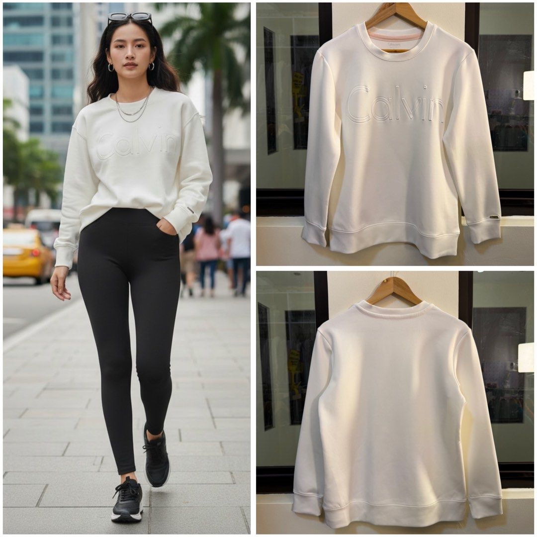 Calvin Klein Performance Long-Sleeve Crewneck Sweatshirt (Category: Coats, Jackets and Outerwear) located in Paranaque City. Submitted by preluxeshop_ph (Listing ID 1470814183, Image 1). Description: Brand: Calvin Klein Performance (Quick Dry line) •Style: Long-Sleeve Crewneck Sweatshirt / Pullover •Color: White with subtle pink inner neck taping •Design Features: Embossed tonal “Calvin” logo lettering across the chest, crew neckline, and ribbed 